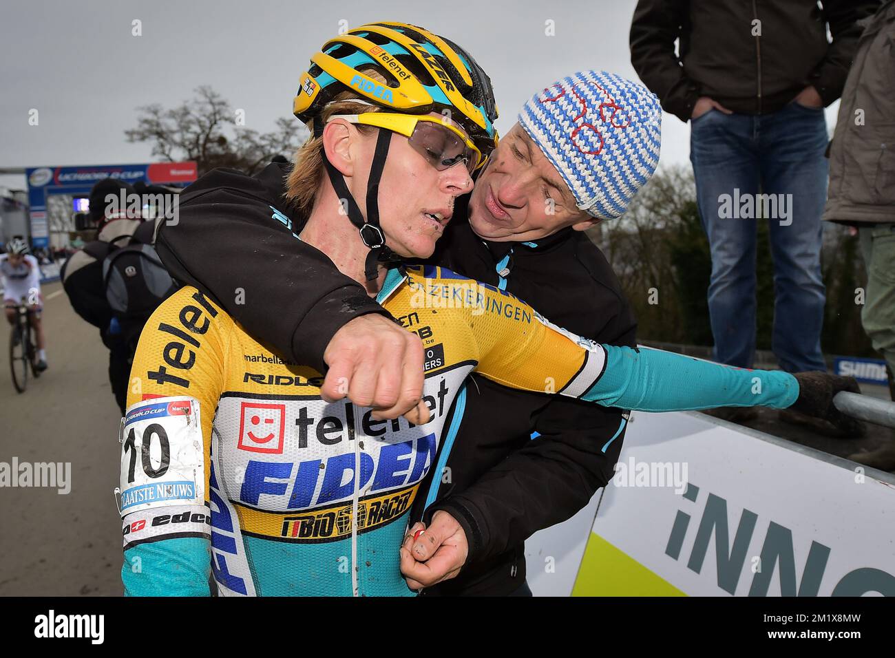 20141221 - NAMUR, BELGIUM: Belgian Ellen Van Loy and Belgian national coach  Rudy De Bie pictured after the cyclocross cycling race in Namur, the fourth  stage in the World Cup cyclocross, Sunday