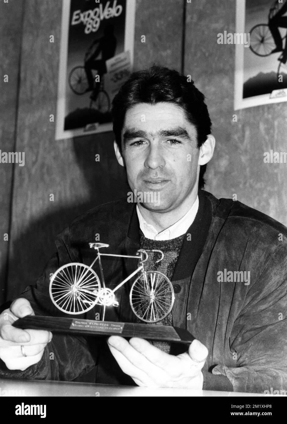 19890125 - BELGIUM (FILE) : This file picture dated 25 January 1989 is about the Belgian cyclist Claude Criquielion. On the occasion of the 'Expo Velo 89' exhibition at the Heysel Halls, Claude Criquielion was awarded by a golden bike for his merit during the last season of cycling competitions. On the picture : Claude Criquielion with his Golden Cycle Trophy. BELGA PHOTO ARCHIVES Stock Photo