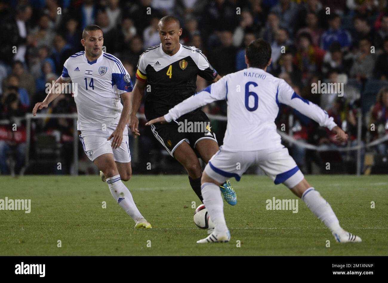 20150331 - BRUSSELS, BELGIUM: Israel's Ben Sahar, Belgium's Vincent Kompany and Israel's Bibras Natkho pictured in action during a qualification game between Israel and Belgian national soccer team Red Devils, Tuesday 31 March 2015, in the Teddy Stadium in Jerusalem, Israel. Belgium plays its fifth game of the Euro 2016 qualification. BELGA PHOTO DIRK WAEM Stock Photo