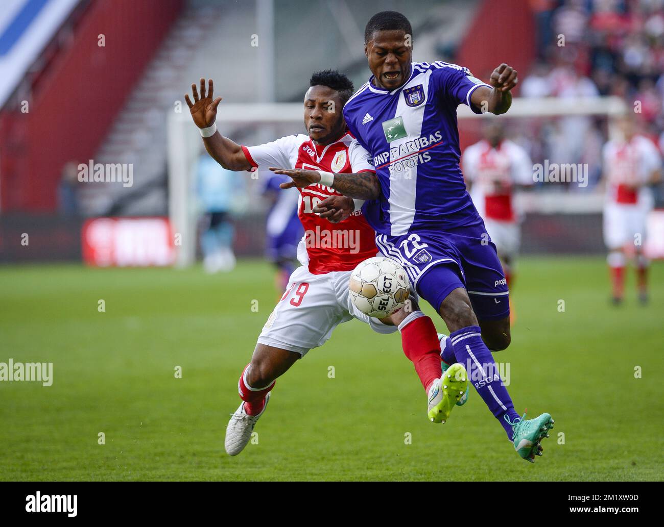 Standard's Imoh Ezekiel and Anderlecht's Chancel Mbemba fight for the ball  during the Jupiler Pro League match between Standard de Liege and RSC  Anderlecht, Sunday 12 April 2015 in Liege, on day