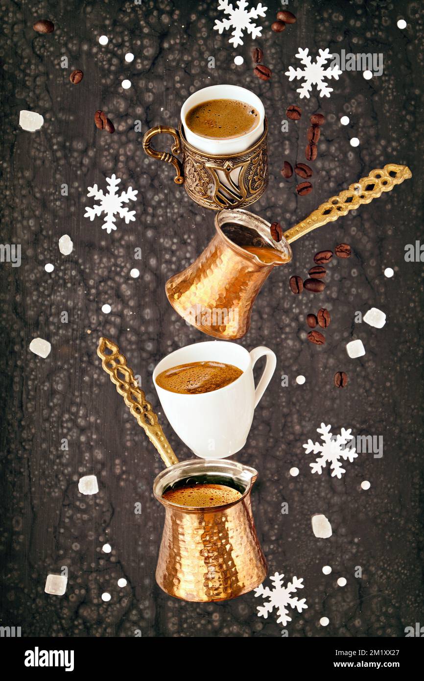 https://c8.alamy.com/comp/2M1XX27/balancing-pyramid-of-jezves-turkish-coffee-pots-and-cups-on-dark-background-with-coffee-beans-and-sugar-2M1XX27.jpg