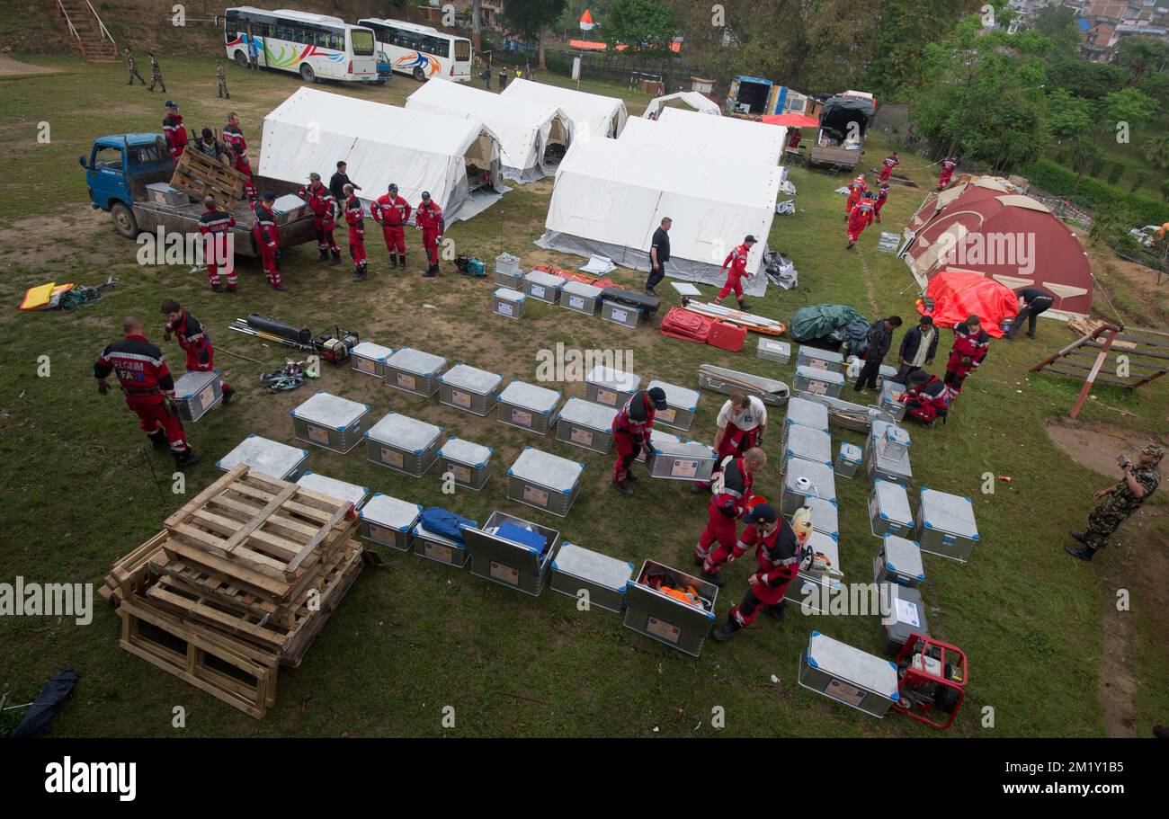 20150430 - GORKHA, NEPAL: The B-Fast team prepares their camp during an emergency aid mission of the Belgian B-Fast disaster aid team in Gorkha (140 km away from Kathmandu), Nepal, Thursday 30 April 2015. Nepal was hit Saturday 25 April by an earthquake causing massive damage in the capital Kathmandu and avalanches at the Everest base camp. More than 5000 people are confirmed to have died. BELGA PHOTO BENOIT DOPPAGNE Stock Photo