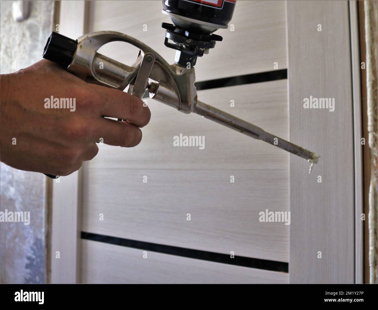 Spray foams gun hires stock photography and images Alamy