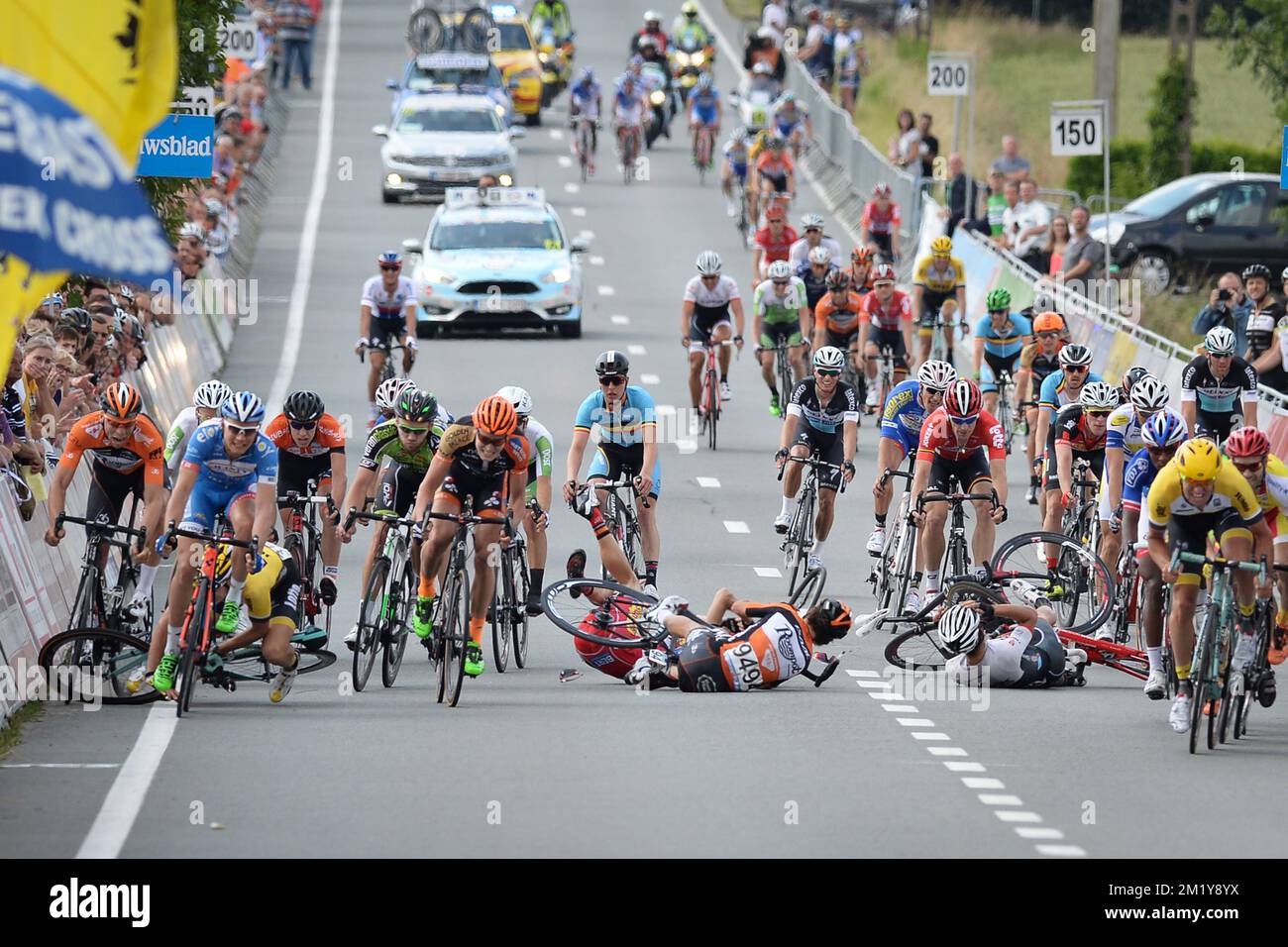 20150624 - INGOOIGEM, BELGIUM: Illustration picture shows multiple cyclists falling in the final meters of the 68th edition of the Halle-Ingooigem cycling race, UCI 1,1 race of 198.8 km from Halle to Ingooigem, Wednesday 24 June 2015. BELGA PHOTO DAVID STOCKMAN Stock Photo