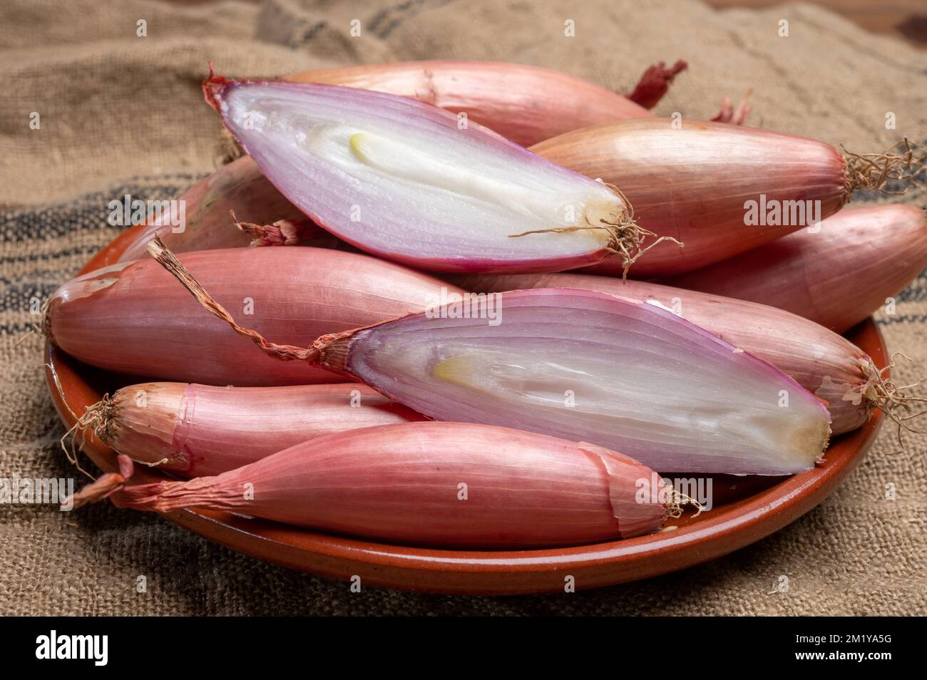 Premium Photo  Red shallots isolated on white background