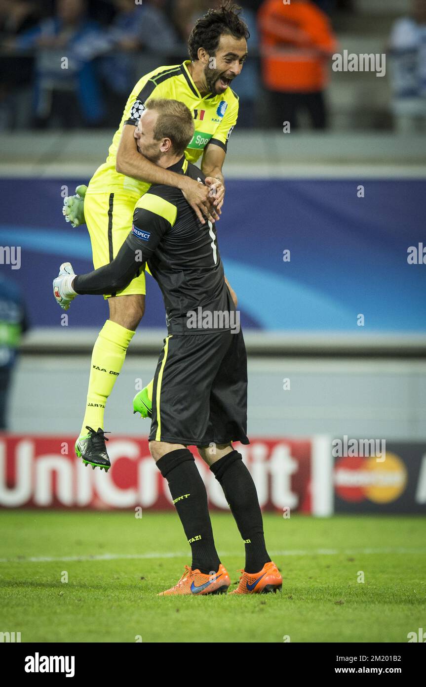 20150916 - GENT, BELGIUM: Gent's 'Rafinha' Rafael Scapini de Almeida and Gent's goalkeeper Matz Sels celebrate after the first game in the group stage of the Uefa Champions League competition, in group H, between Belgian first league soccer team KAA Gent and Olympique Lyon, in Gent, Wednesday 16 September 2015. BELGA PHOTO JASPER JACOBS Stock Photo