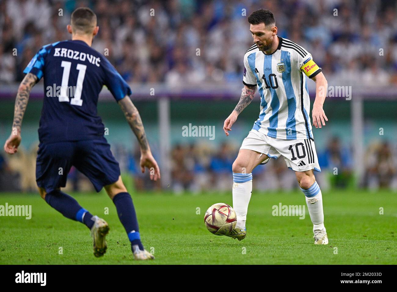 LUSAIL CITY, QATAR - DECEMBER 13: Marcelo Brozovic of Croatia and Lionel Messi of Argentina during the Semi Final - FIFA World Cup Qatar 2022 match between Argentina and Croatia at the Lusail Stadium on December 13, 2022 in Lusail City, Qatar (Photo by Pablo Morano/BSR Agency) Stock Photo