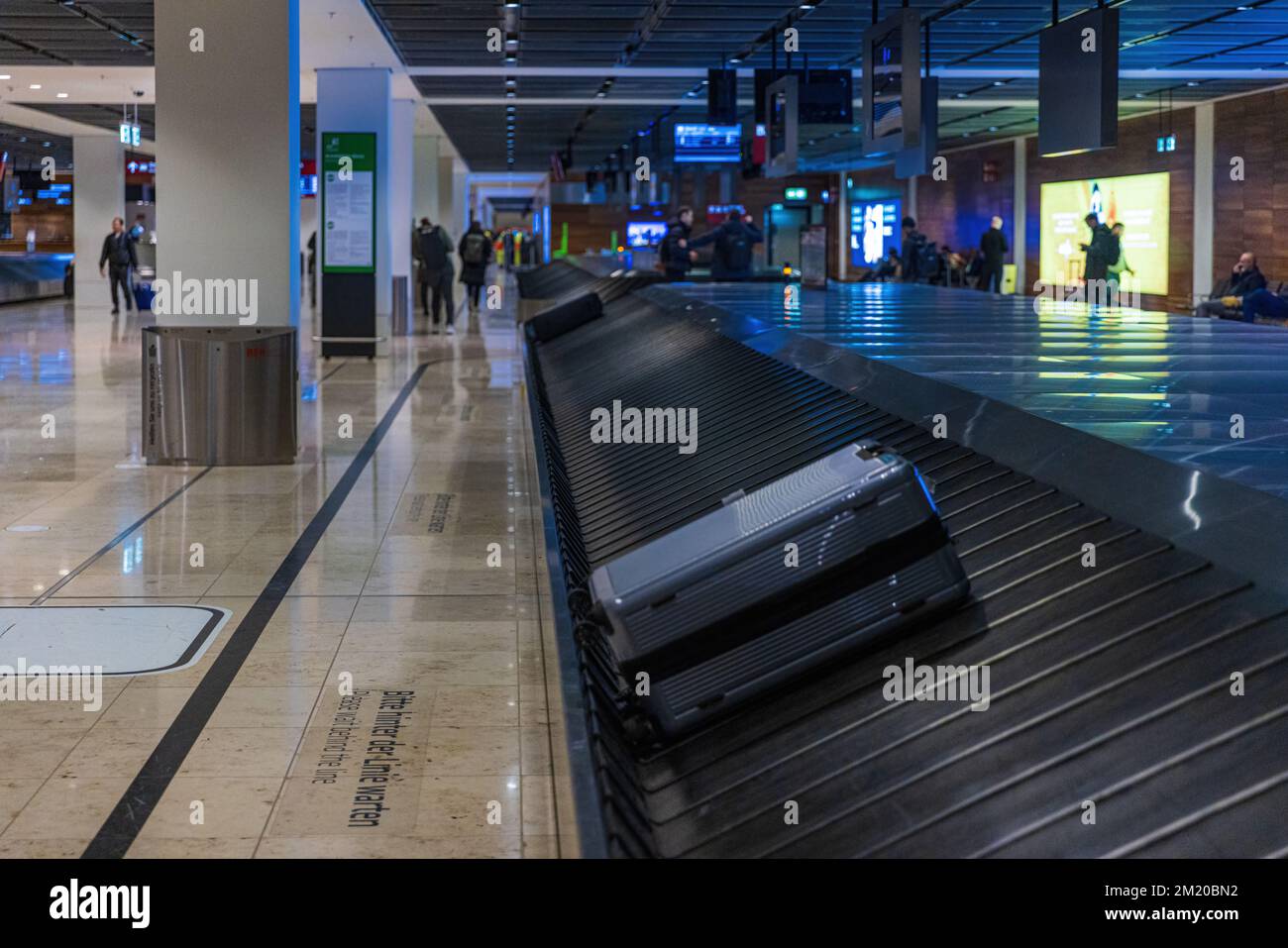 BERLIN, GERMANY- DECEMBER 12, 2022: Baggage Carousel at Berlin Brandenburg BER Willy Brandt Airport Terminal 1 in Berlin, Germany. Stock Photo
