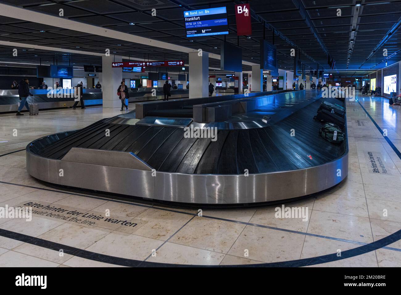 BERLIN, GERMANY- DECEMBER 12, 2022: Baggage Carousel at Berlin Brandenburg BER Willy Brandt Airport Terminal 1 in Berlin, Germany. Stock Photo