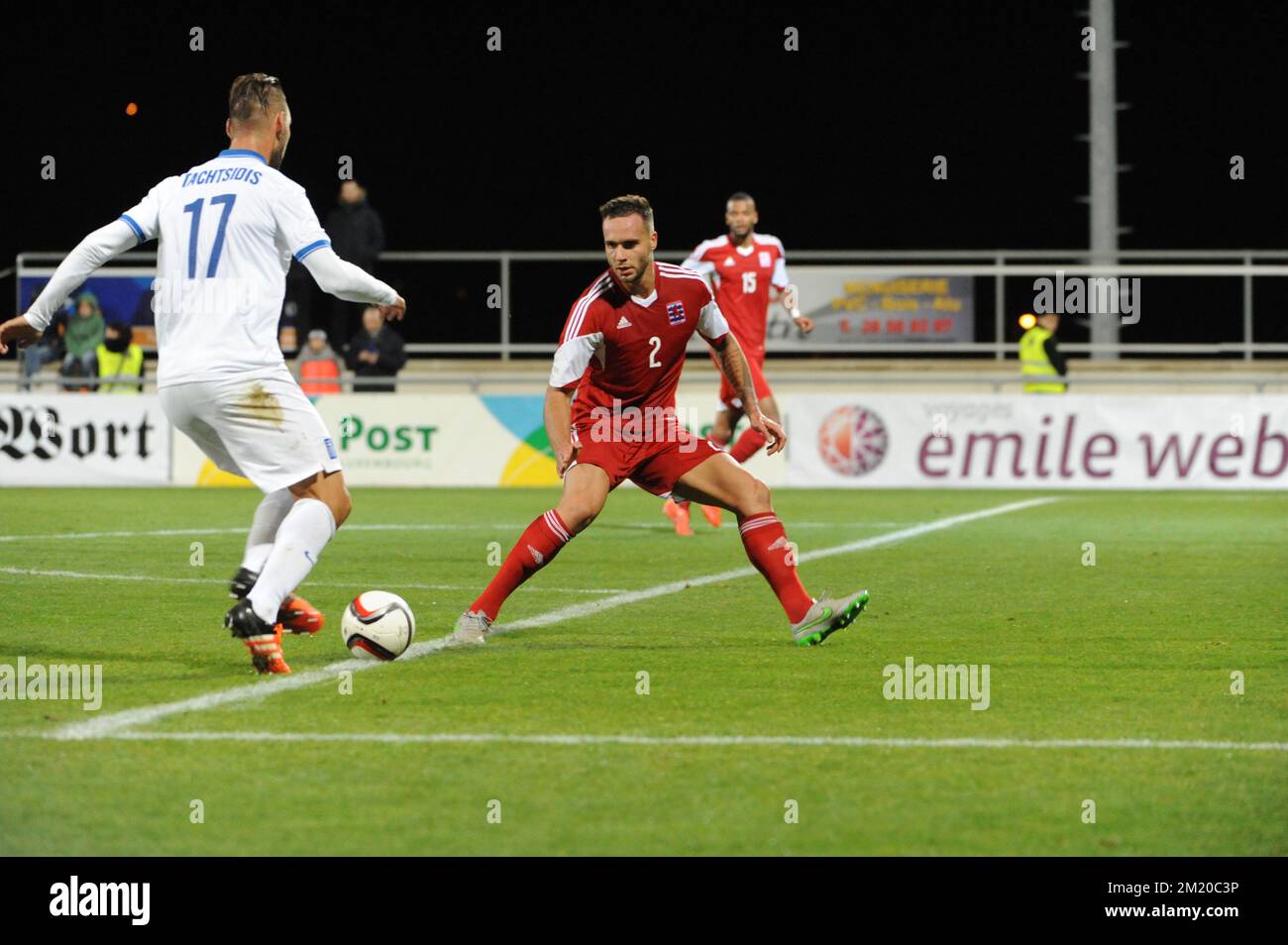 20151113 - DIFFERDANGE, LUXEMBOURG: Greece's Panagiotis Tachtsidis and Luxembourg's Maxime Chanot fight for the ball during a friendly soccer game between Luxembourg national team and Greece, in Differdange, Luxembourg, Friday 13 November 2015. BELGA PHOTO SOPHIE KIP Stock Photo