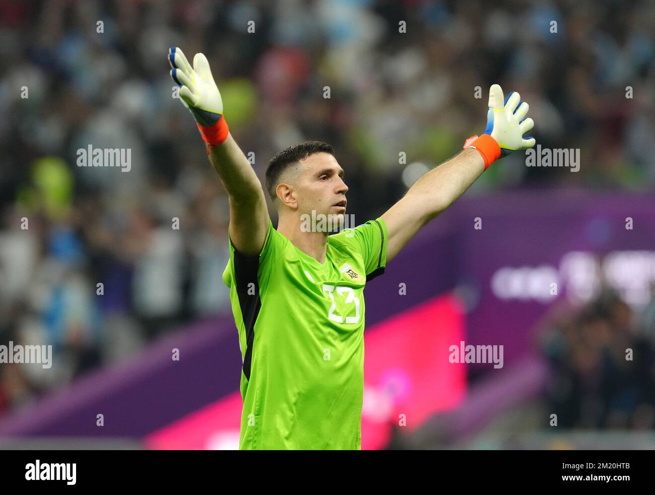 Argentina goalkeeper Emiliano Martinez celebrates after Lionel Messi scores their side's first goal of the game during the FIFA World Cup Semi-Final match at the Lusail Stadium in Lusail, Qatar. Picture date: Tuesday December 13, 2022. Stock Photo