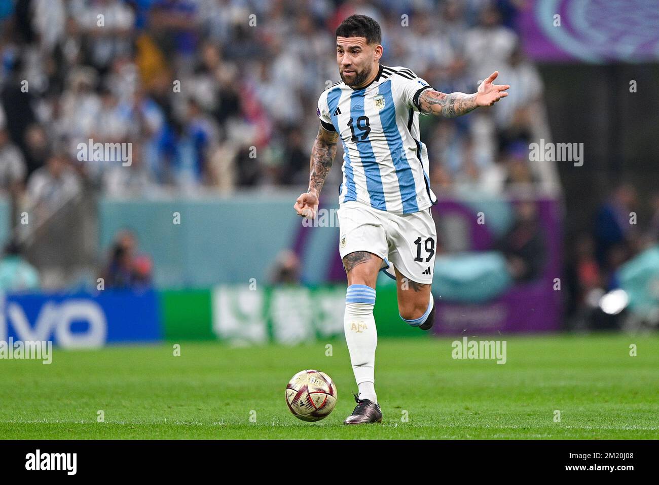 LUSAIL CITY, QATAR - DECEMBER 13: Nicolas Otamendi of Argentina runs with the ball during the Semi Final - FIFA World Cup Qatar 2022 match between Argentina and Croatia at the Lusail Stadium on December 13, 2022 in Lusail City, Qatar (Photo by Pablo Morano/BSR Agency) Stock Photo
