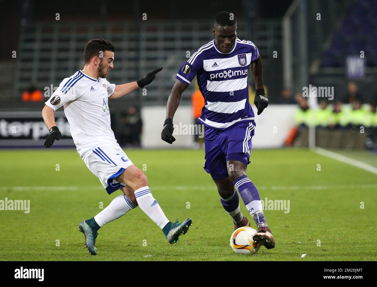 BUDAPEST, HUNGARY - AUGUST 9: Gara Garayev of Qarabag FK fouls Aissa  Laidouni of Ferencvarosi TC during the UEFA Champions League Qualifying  Round match between Ferencvarosi TC and Qarabag FK at Ferencvaros