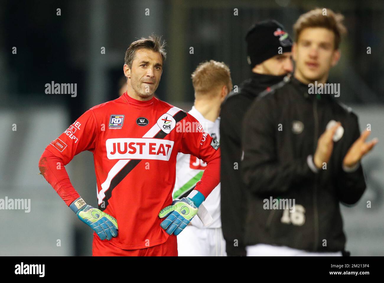 OHL's goalkeeper Rudy Riou looks dejected after the Jupiler Pro League match between OH Leuven and Club Brugge, in Heverlee, Sunday 13 March 2016, on day 30 of the Belgian soccer championship. BELGA PHOTO BRUNO FAHY Stock Photo