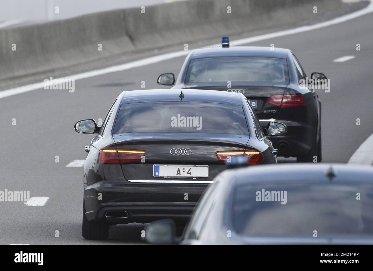 Vice-Prime Minister and Interior Minister Jan Jambon must be in an Audi car, with car plate A4, on his way to visit Brussels Airport, in Zaventem, Tuesday 22 March 2016. Two explosions in the departure hall of Brussels Airport this morning took the lives of 14 people, 81 got injured. Another explosion happened in the Maelbeek - Maalbeek subway station, Brussels' public transport company STIB-MIVB has confirmed 20 deaths and 106 injured people. Government sources speak of a terrorist attack. The terrorist threat level has been heightened to four across the country. BELGA PHOTO DIRK WAEM Stock Photo