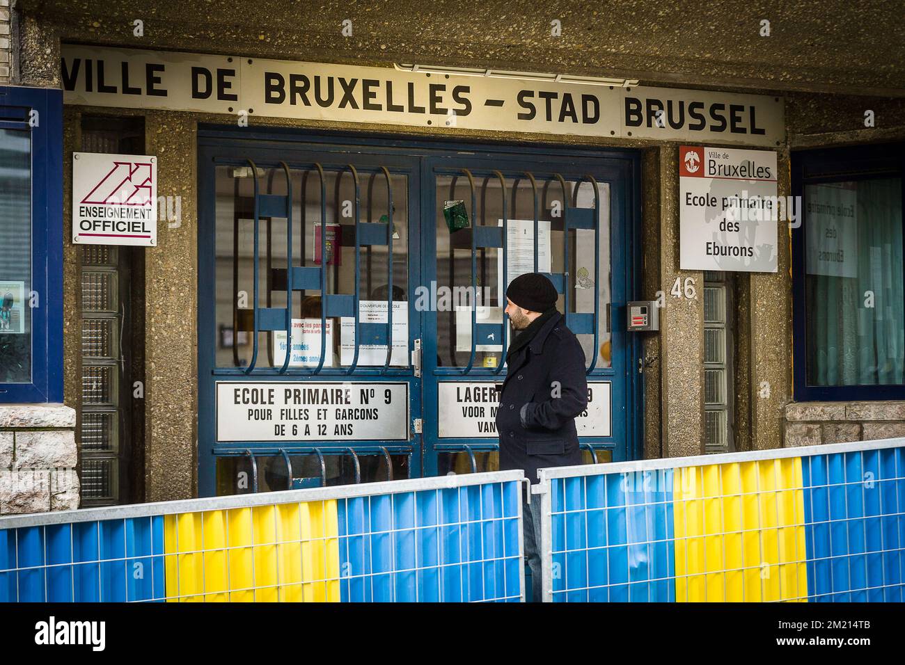 A man arrives at the 'Ecole primaire des Eburons' school in Brussels,  Tuesday 22 March 2016. Two explosions in the departure hall of Brussels  Airport this morning took the lives of 14, image size:1300x956
