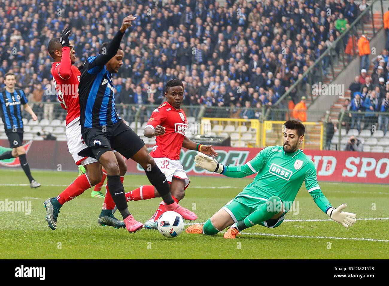 Club's Jose Izquierdo and Standard's goalkeeper Victor Valdes Arriba fight for the ball during the Croky Cup final between Belgian soccer teams Club Brugge and Standard de Liege, on Sunday 20 March 2016, in Brussels.  Stock Photo