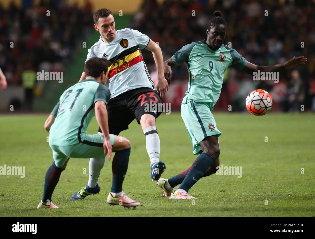Belgium's Thomas Vermaelen and Portugal's Eder fight for the ball during a soccer game between the Portugal national team and the Belgian Red Devils in Leiria, Portugal, Tuesday 29 March 2016, a preparation for the upcoming Euro2016 tournament. The match was moved due to safety concerns after the Brussels terrorists attacks. BELGA PHOTO VIRGINIE LEFOUR Stock Photo