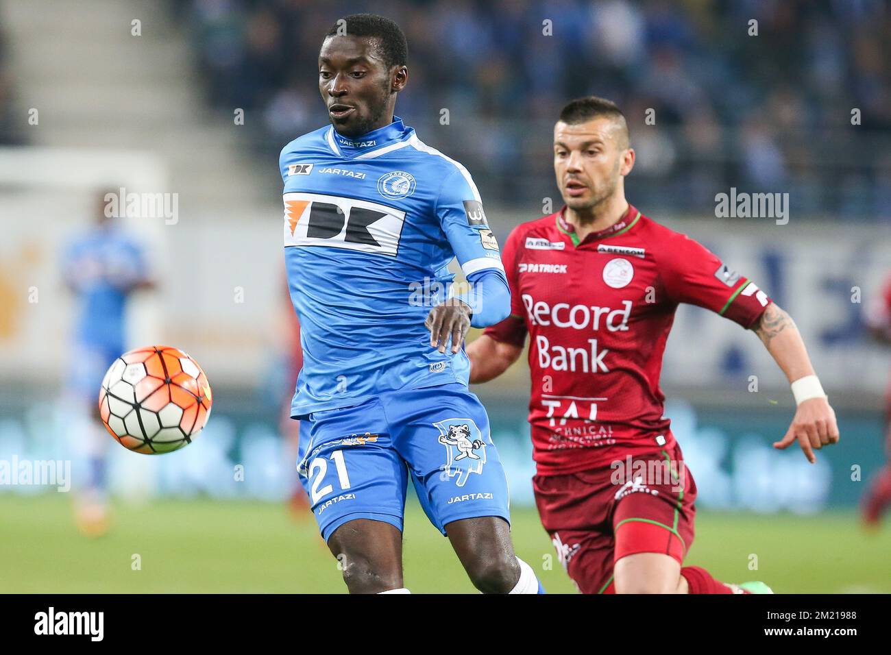 Gent's Nana Asare and Essevee's Alessandro Cordaro fight for the ball during the Jupiler Pro League match between KAA Gent and Zulte Waregem, in Gent, Friday 01 April 2016, on day 1 of the Play-off 1 of the Belgian soccer championship.  Stock Photo