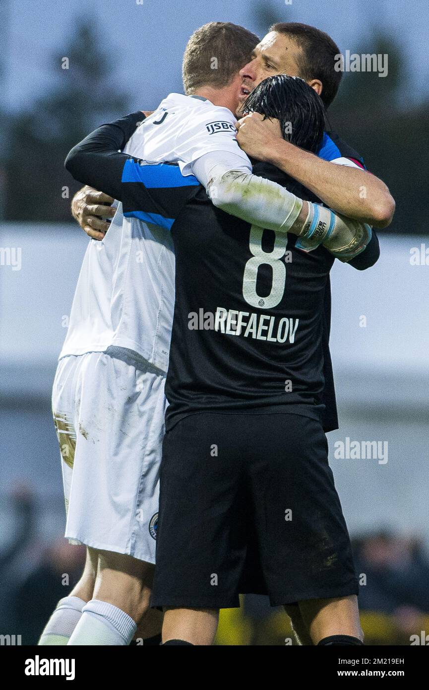 Club's goalkeeper Ludovic Butelle, Club's Lior Refaelov and Club's captain Timmy Simons celebrate after winning the Jupiler Pro League match between KV Oostende and Club Brugge, in Roeselare, Saturday 02 April 2016, on day 1 of the Play-off 1 of the Belgian soccer championship. Stock Photo