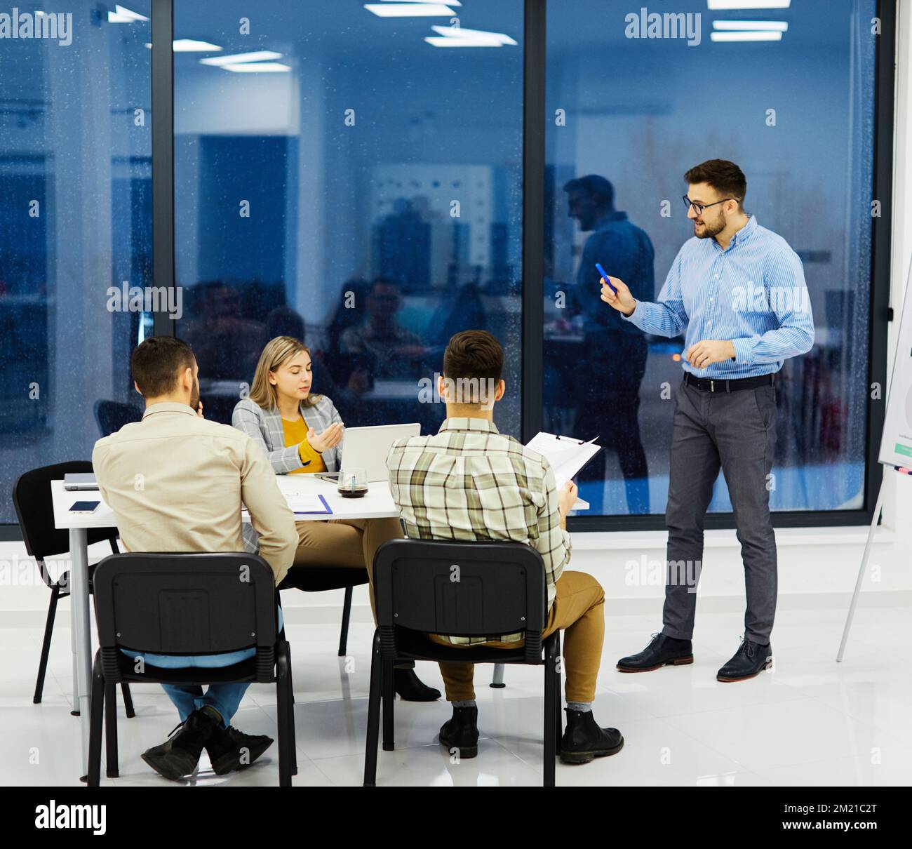 young business people meeting office teamwork group whiteboard presentation seminar man businessman startup project idea Stock Photo