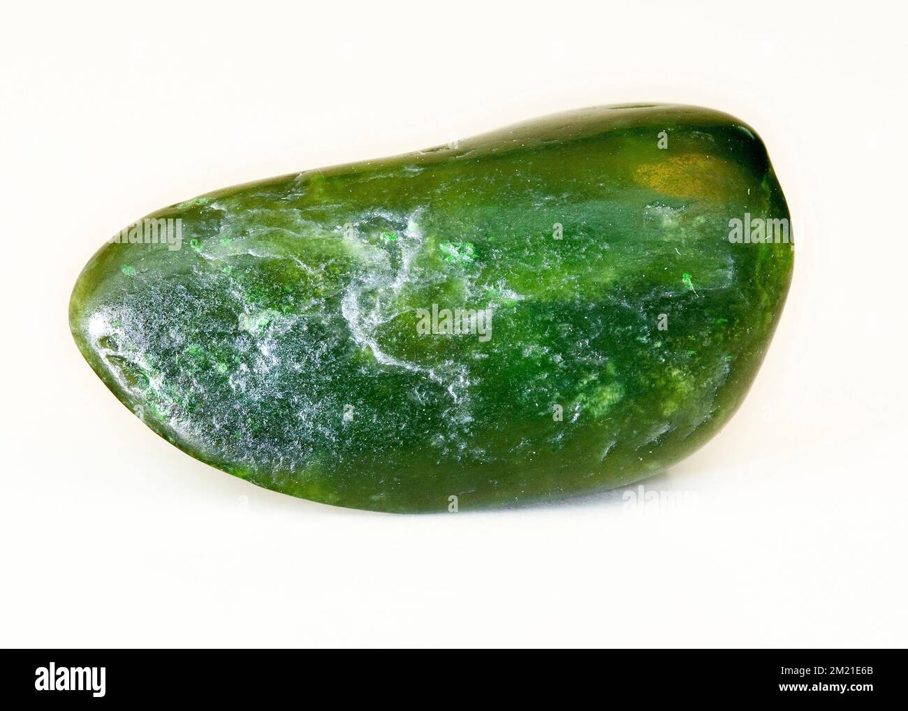 Macro close up colour photograph of a polished " Maori Greenstone Jade
