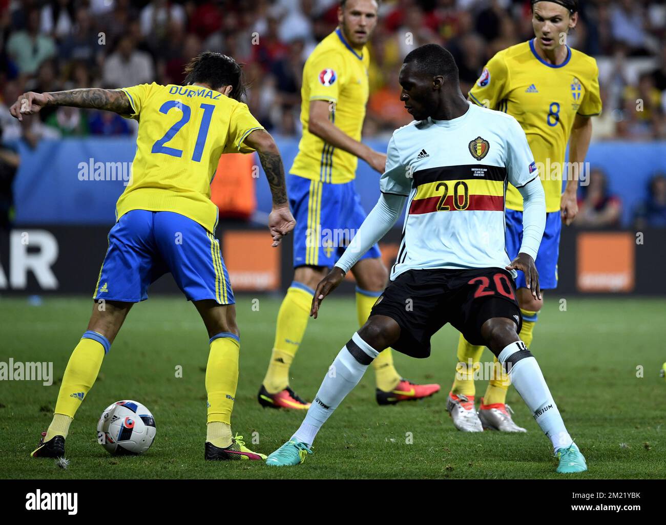 Sweden's Jimmy Durmaz and Belgium's Christian Benteke fight for the ball during a soccer game between Belgian national soccer team Red Devils and Sweden, in group E of the group stage of the UEFA Euro 2016 European Championships, on Wednesday 22 June 2016, in Nice, France.  Stock Photo