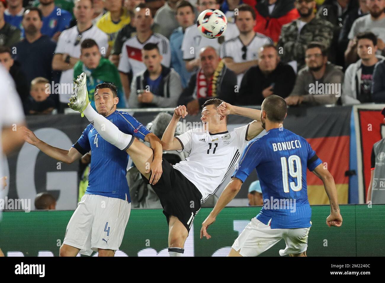 Italy's Matteo Darmian and Germany's Julian Draxler fight for the ball during a soccer game between German team and Italian team, in the quarter-finals of the UEFA Euro 2016 European Championships, on Friday 01 July 2016, in Bordeaux, France.  Stock Photo