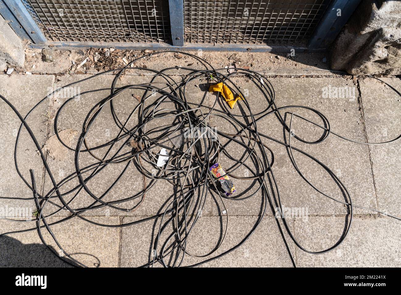 pavement, tangled wires Stock Photo Alamy