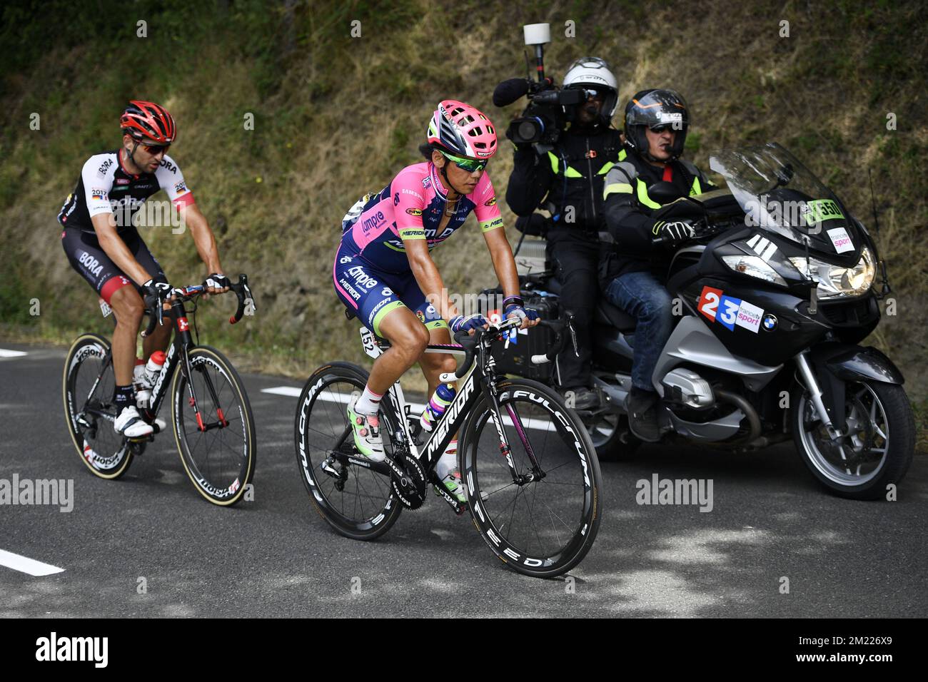 Czech Jan Barta of Bora-Argon 18 and Japanese Yukiya Arashiro of Lampre-Merida pictured in action during the sixth stage of the 103rd edition of the Tour de France cycling race, 190,5 km from Arpajon-sur-Cere to Montauban, on Thursday 07 July 2016, in France. BELGA PHOTO YORICK JANSENS Stock Photo