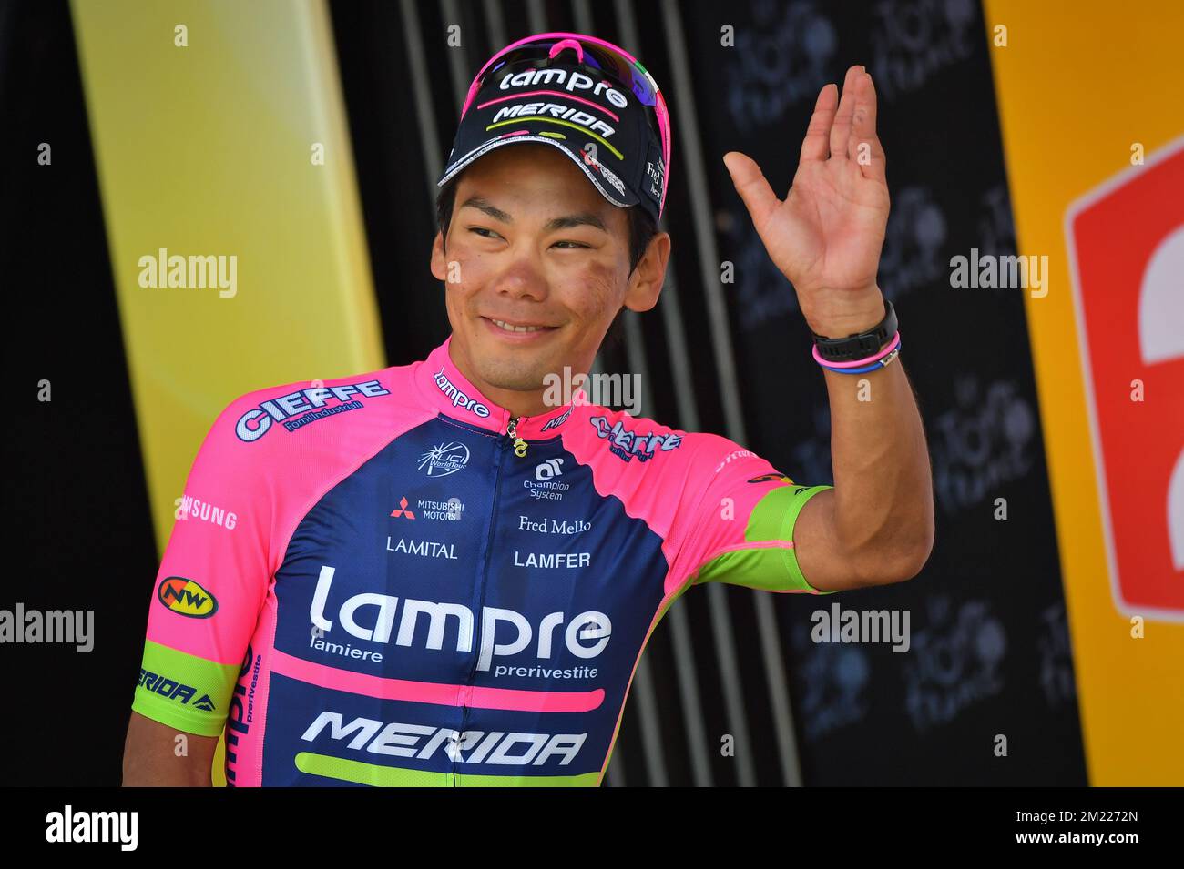 Japanese Yukiya Arashiro of Lampre-Merida celebrates on the podium ...