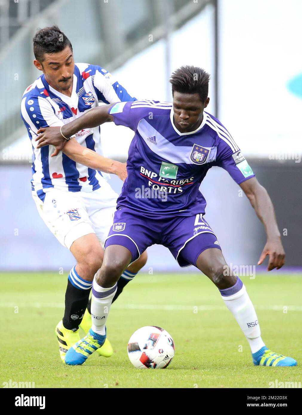 Heerenveen's Reza Ghoochannejhad and Anderlecht's Fabrice N'Sakala fight for the ball during a friendly soccer game between RSC Anderlecht and Dutch SC Heerenveen, Wednesday 20 July 2016 in Brussels. Stock Photo