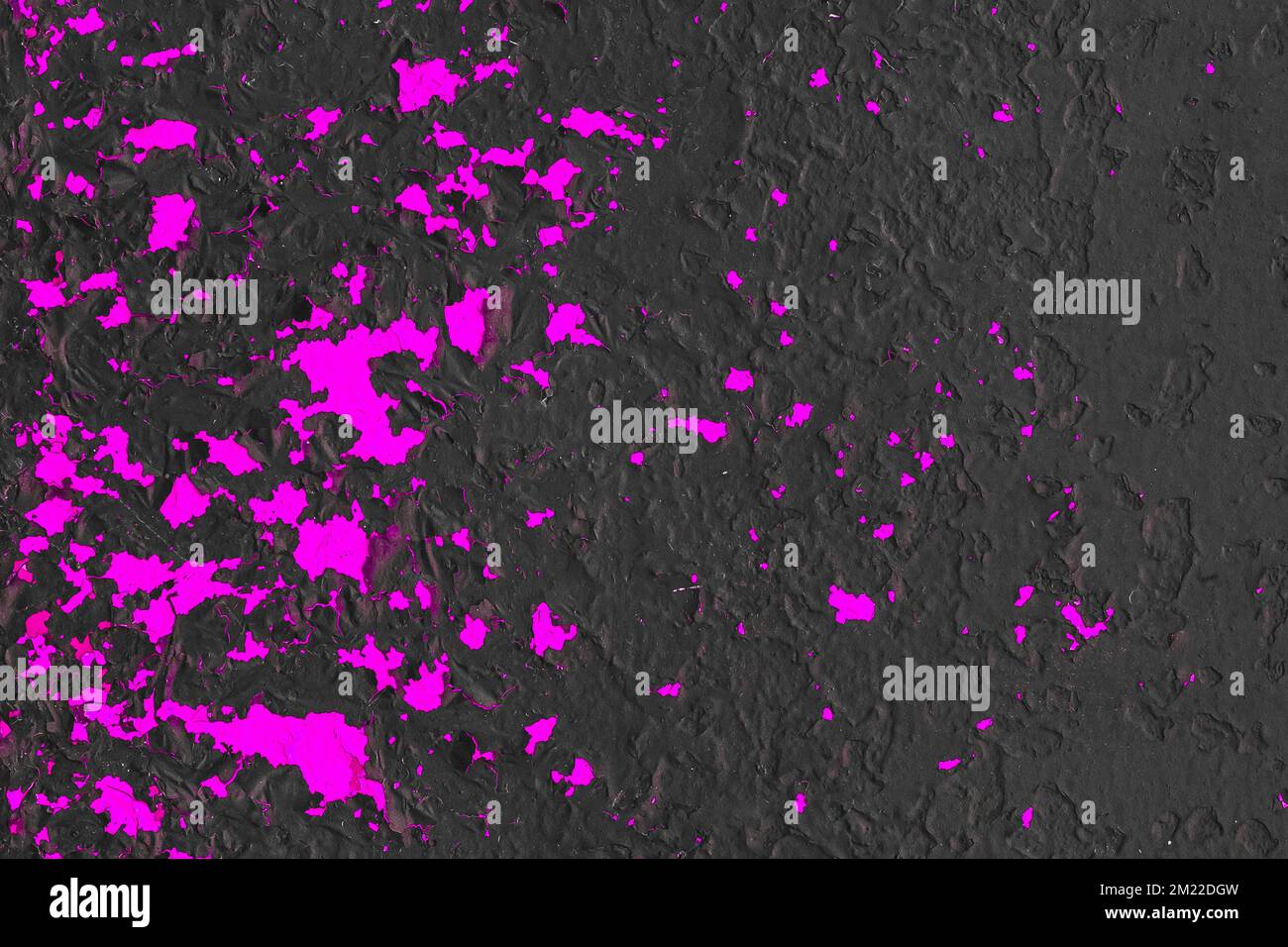 Black painted dark metal surface with old pink purple violet lilac