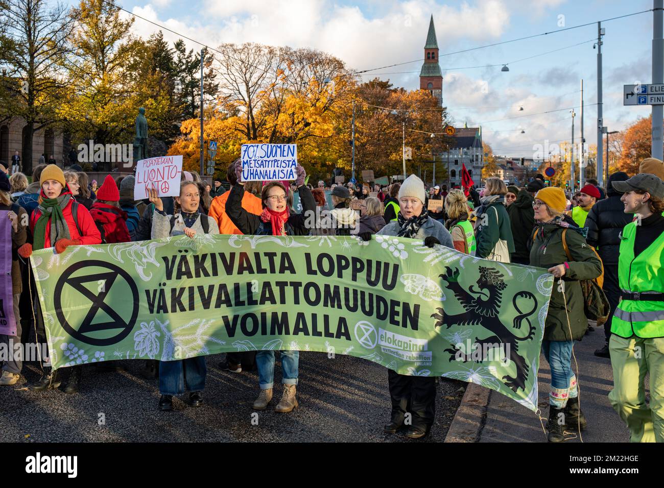 Demonstrators blocking traffic on Mannerheimintie at Elokapina or Extinction Rebellion Finland protest against nature loss in Helsinki, Finland Stock Photo