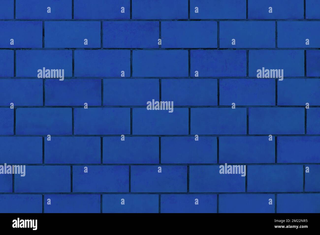 Blue paint on brick blocks urban design wall texture pattern background architecture stone