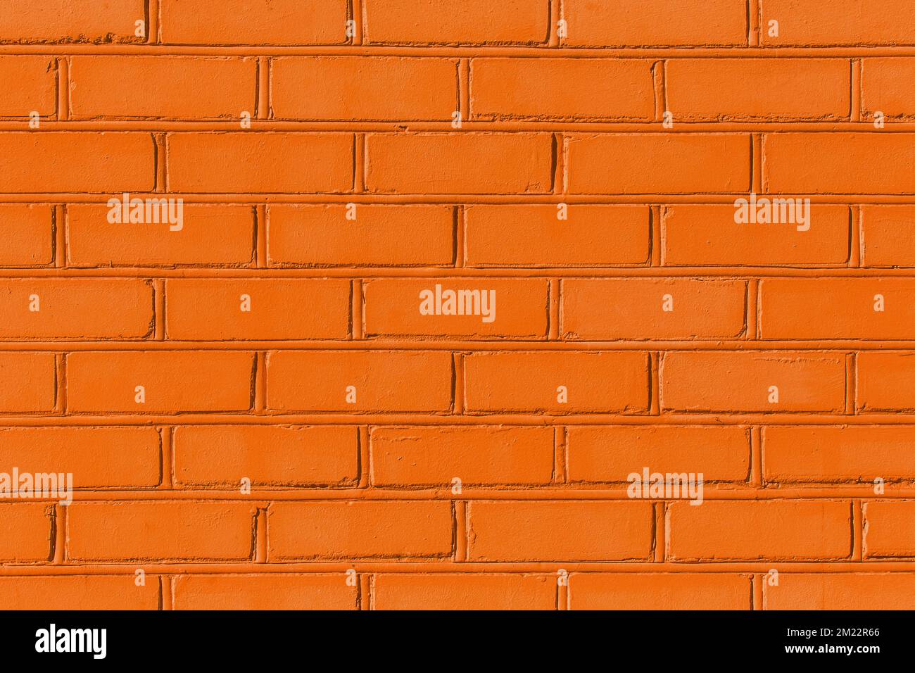 Orange-brown paint on brick old wall texture background abstract pattern stone. Stock Photo