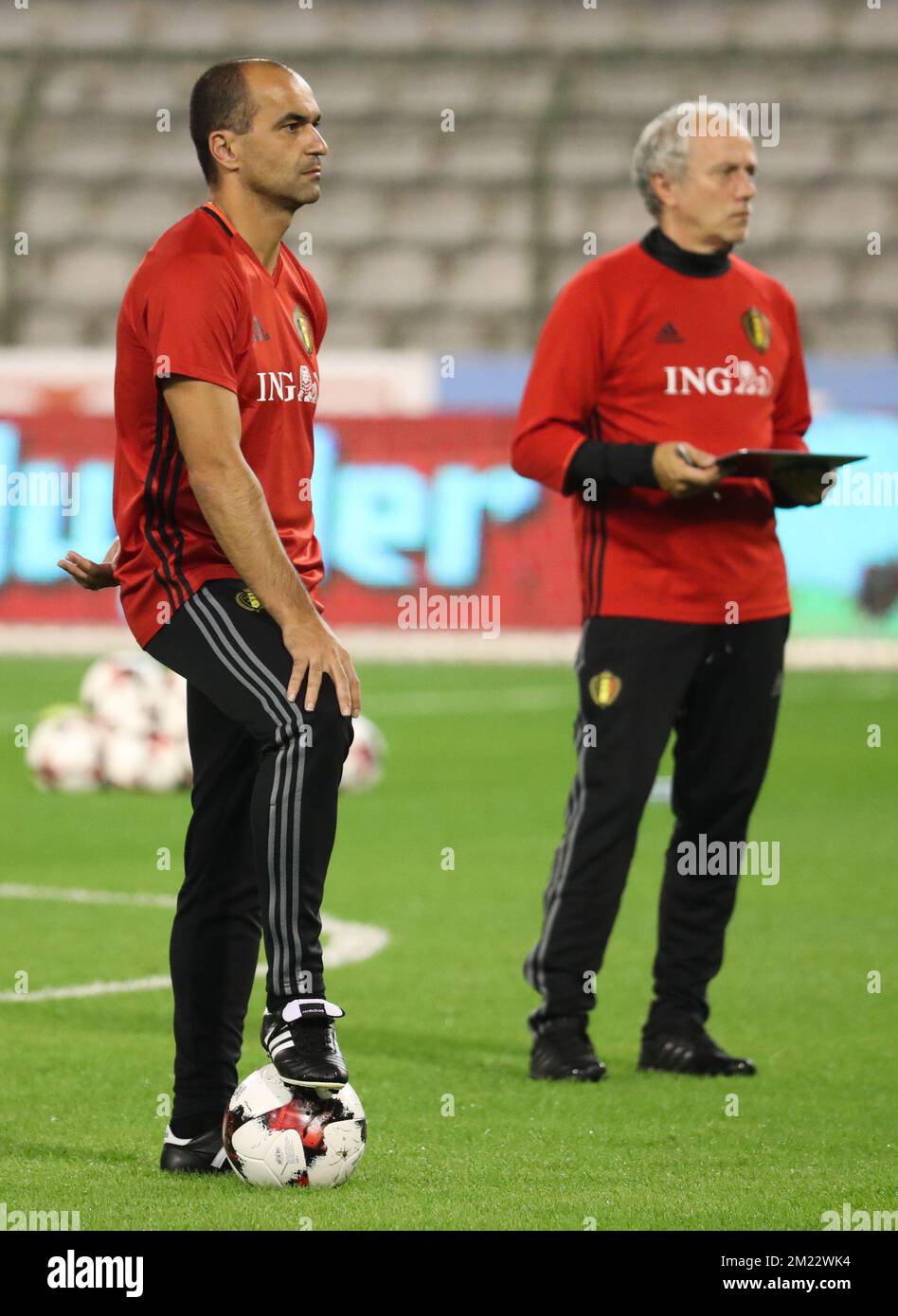 Spain's Javi Martinez and Belgium's video analyst Herman Landtsheer pictured during a training session of Belgian national soccer team Red Devils, on Wednesday 31 August 2016, in Brussels. Stock Photo