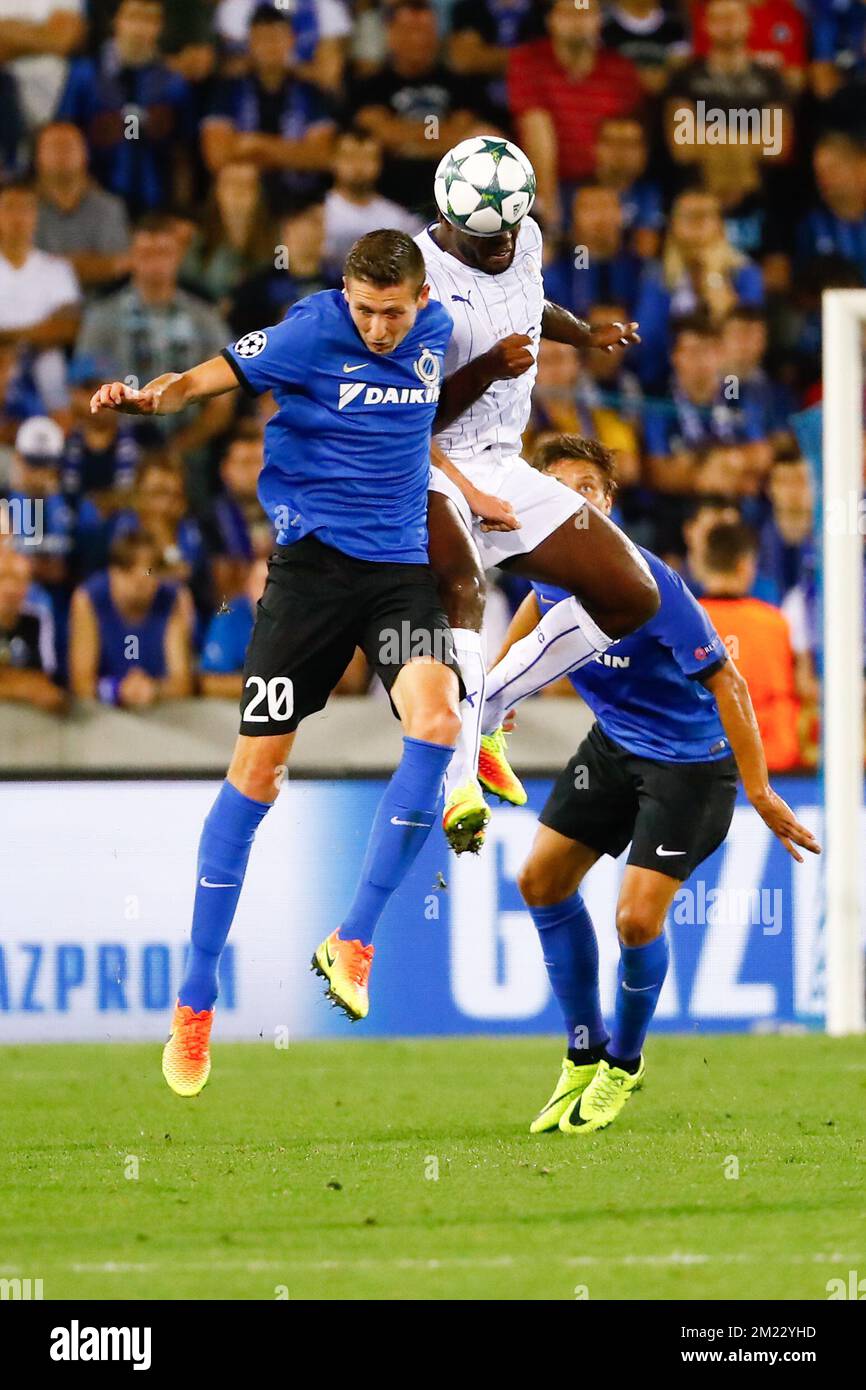Club's Hans Vanaken and Leicester's Ahmed Musa fight for the ball during a game of the first day of the group stage of the UEFA Champions League competition between Belgian first division soccer team Club Brugge KV and English club Leicester City F.C. in the group G in Brugge, Wednesday 14 September 2016. BELGA PHOTO KURT DESPLENTER Stock Photo