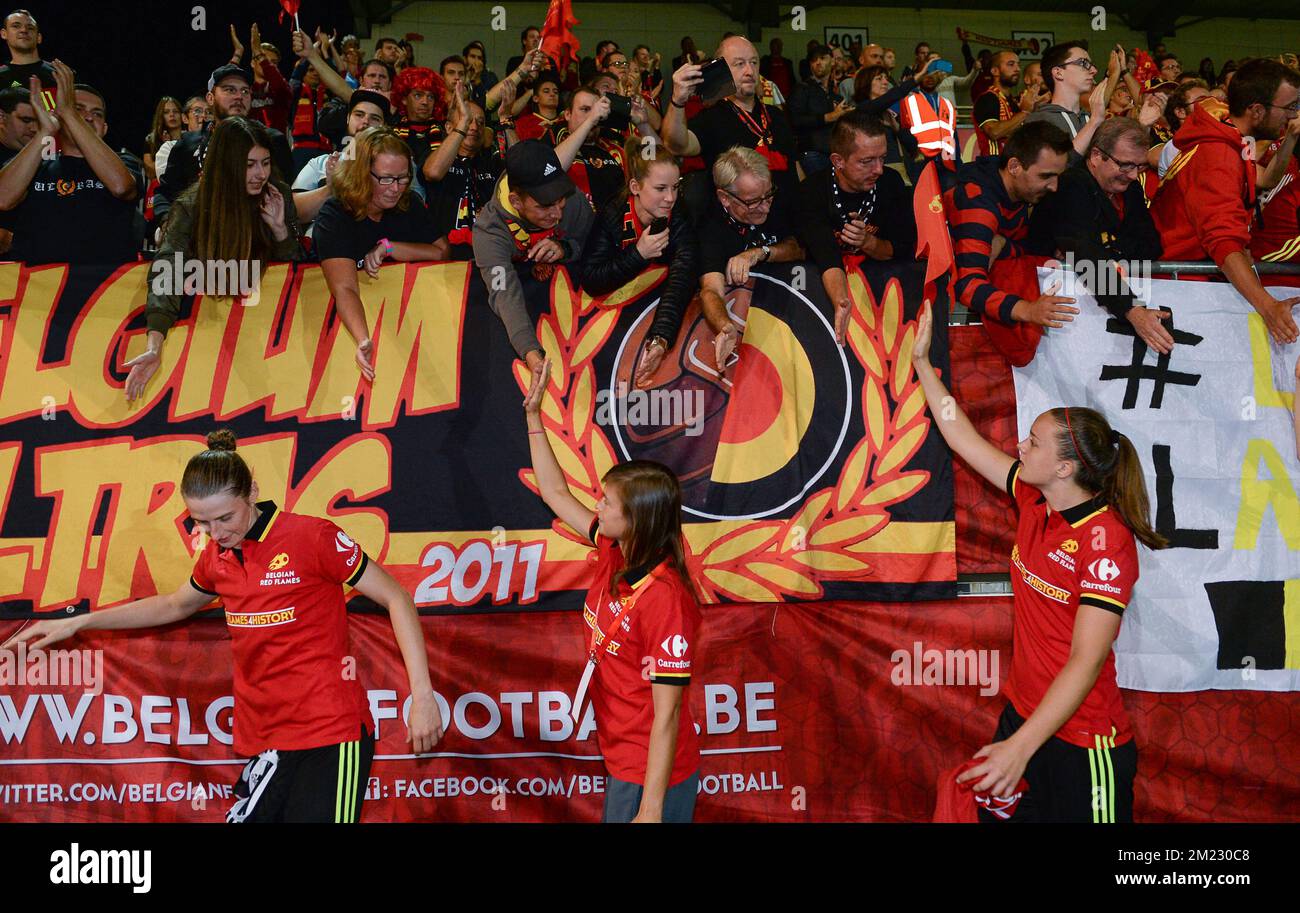 Belgian players celebrate their qualification with the fans, despite a 0-2 loss at a Euro2017 qualification match between the Red Flames Belgian national women soccer team, and England, Tuesday 20 September 2016 in Leuven. The Red Flames are already qualified for the Uefa Women's Euro 2017 that will take place from July 16th to August 6th in The Netherlands. BELGA PHOTO DAVID CATRY Stock Photo