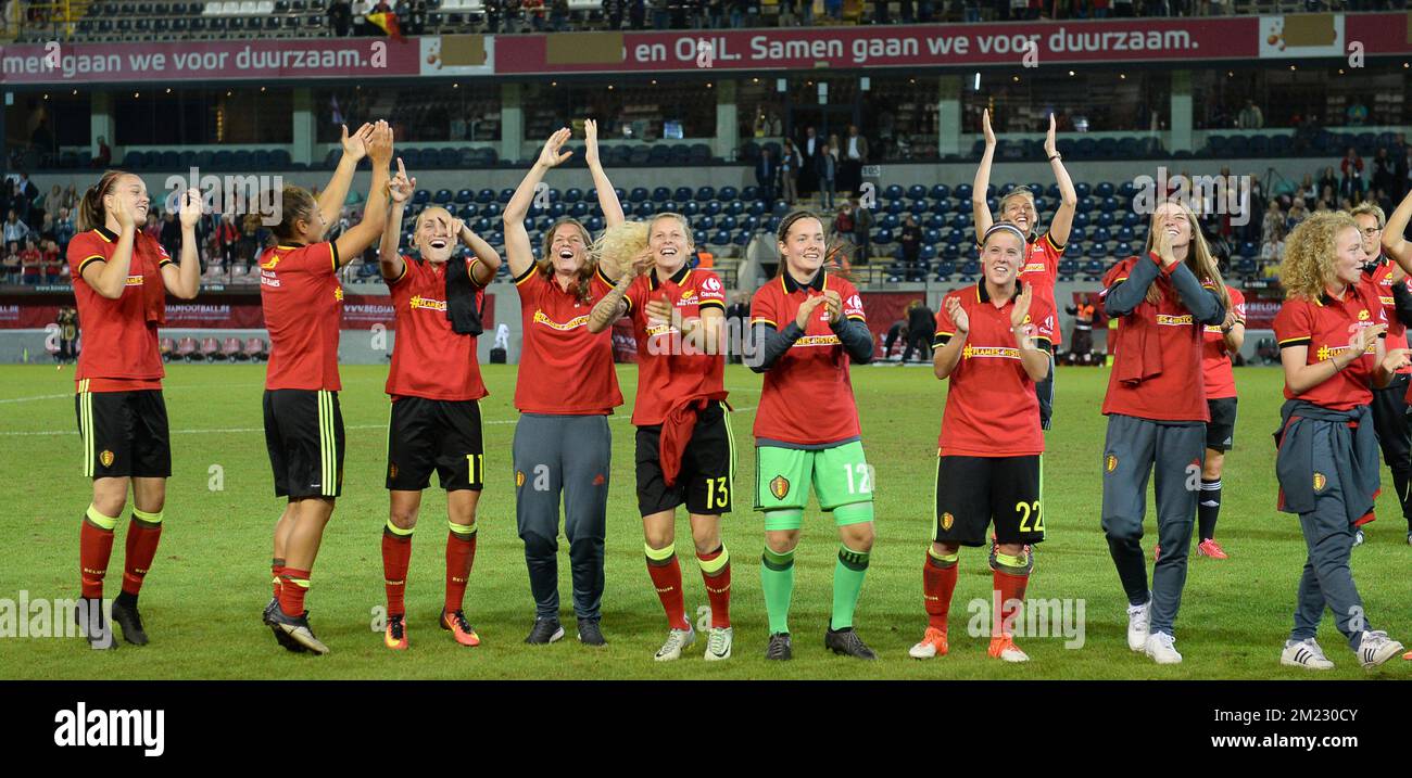 Belgian players celebrate their qualification, despite their 0-2 loss at a Euro2017 qualification match between the Red Flames Belgian national women soccer team, and England, Tuesday 20 September 2016 in Leuven. The Red Flames are already qualified for the Uefa Women's Euro 2017 that will take place from July 16th to August 6th in The Netherlands. BELGA PHOTO DAVID CATRY Stock Photo