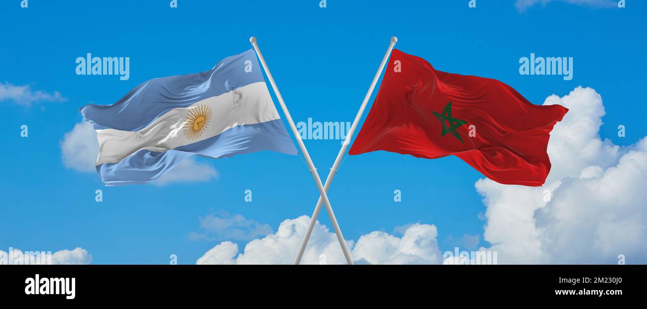 crossed national flags of Argentine and Morocco flag waving in wind at ...