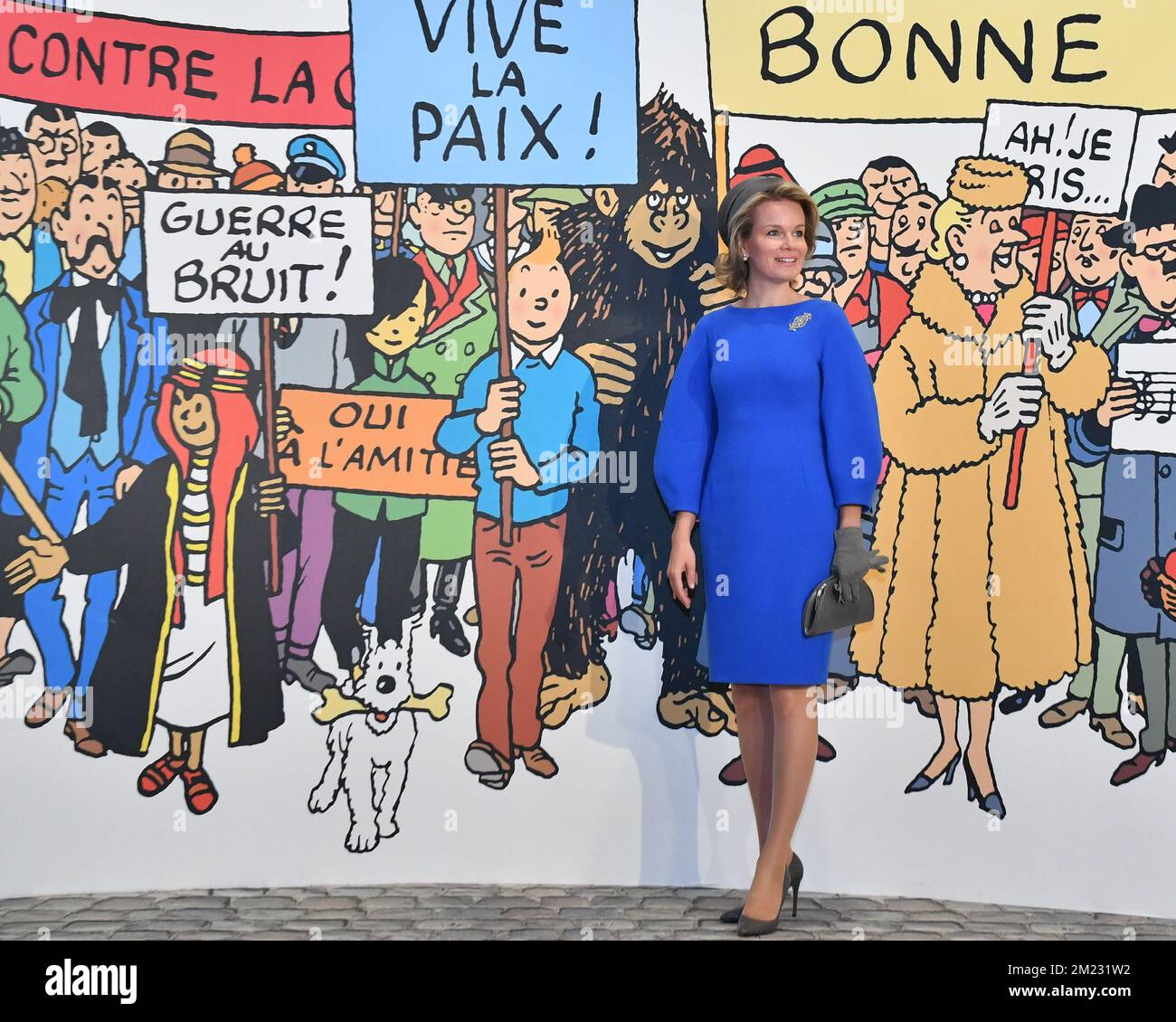 Queen Mathilde of Belgium poses in front of a giant poster at a royal visit to the exposition on Belgian cartoonist Herge (Georges Remi) at the Grand Palais museum in Paris, France, Wednesday 05 October 2016. BELGA PHOTO BENOIT DOPPAGNE Stock Photo