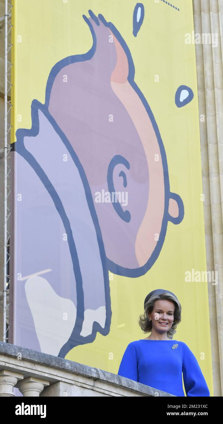 Queen Mathilde of Belgium poses in front of a giant poster for the exhibition, at the arrival for a royal visit to the exposition on Belgian cartoonist Herge (Georges Remi) at the Grand Palais museum in Paris, France, Wednesday 05 October 2016. BELGA PHOTO BENOIT DOPPAGNE Stock Photo