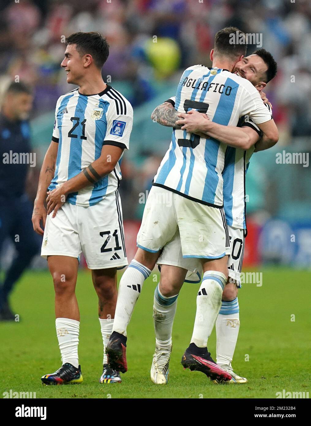 Argentina's Paulo Dybala, Nicolas Tagliafico and Lionel Messi celebrate progression to the final following the FIFA World Cup Semi-Final match at the Lusail Stadium in Lusail, Qatar. Picture date: Tuesday December 13, 2022. Stock Photo