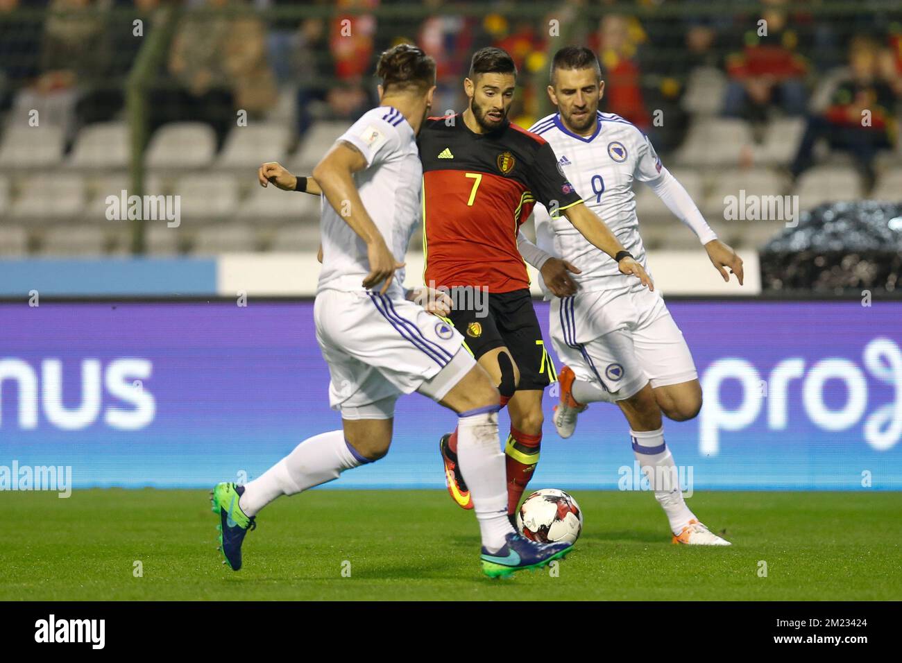 Bosnia's Ermin Bicakcic , Belgium's Yannick Ferreira Carrasco and Bosnia's Vedad Ibisevic fight for the ball during a soccer match between Belgium's Red Devils and Bosnia and Herzegovina, the second World Championships 2018 Qualification game in Group H, on Friday 07 October 2016, in Brussels. BELGA PHOTO BRUNO FAHY Stock Photo