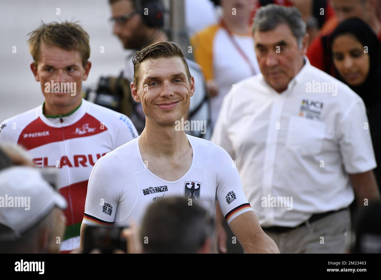 Belarusian Vasil Kiryienka of Team Sky, German Tony Martin of team Etixx - Quick-Step and Former Belgian cyclist Eddy Merckx pictured after the men elite individual time trial at the 2016 UCI World Road World Cycling Championships in Doha, Qatar, Wednesday 12 October 2016. BELGA PHOTO YORICK JANSENS Stock Photo