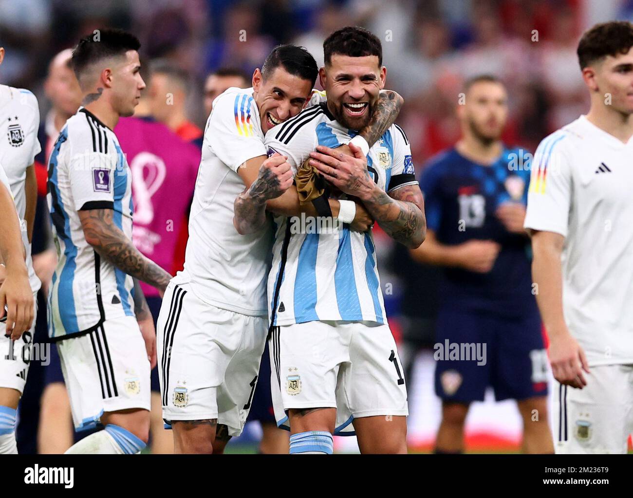 Doha, Qatar, 13th December 2022. Angel Di Maria of Argentina and Nicolas Otamendi of Argentina celebrate the win  during the FIFA World Cup 2022 match at Lusail Stadium, Doha. Picture credit should read: David Klein / Sportimage Stock Photo