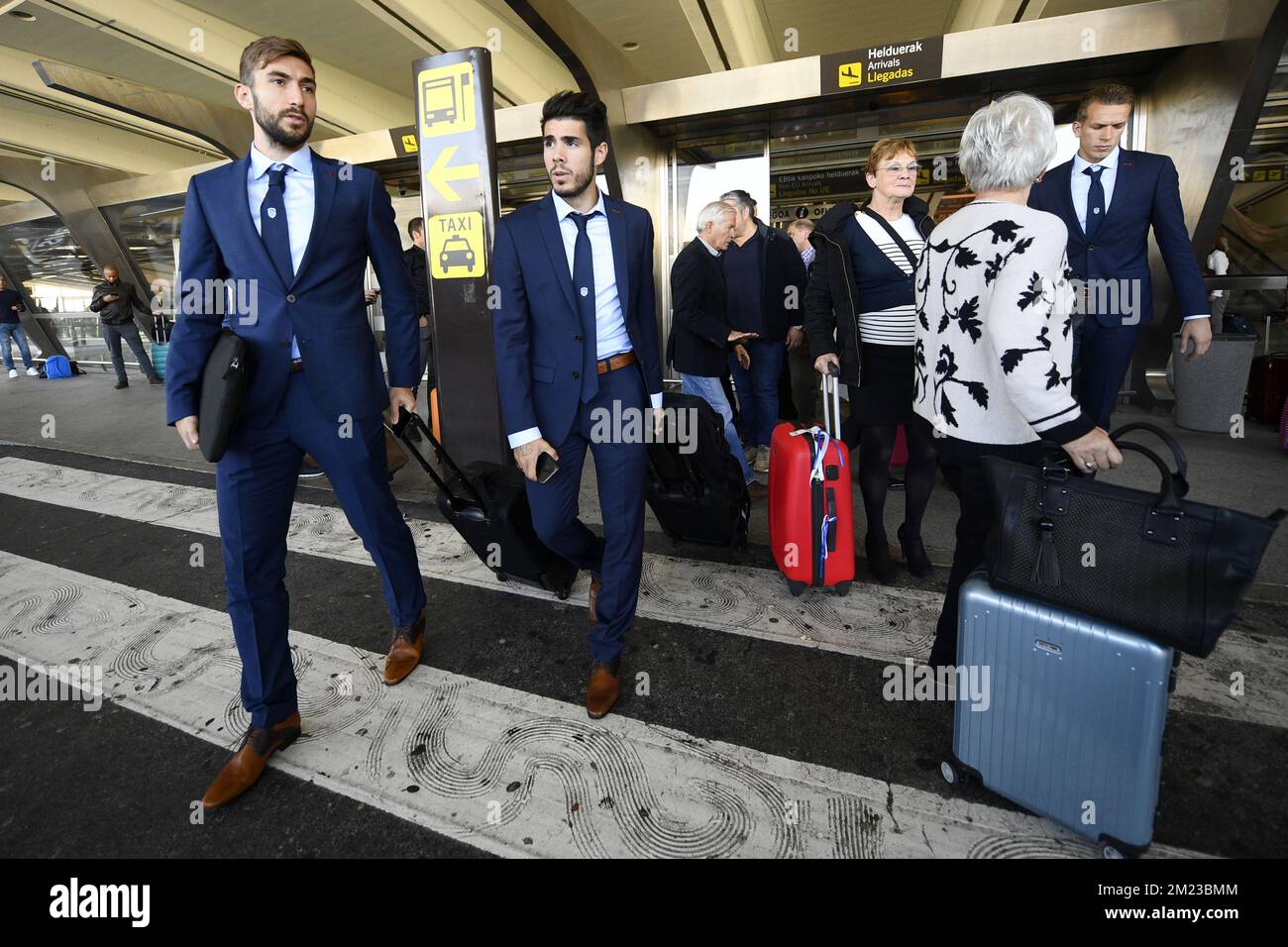 Genk's Tino-Sven Susic, Genk's Alejandro Pozuelo and Genk's goalkeeper Marco Bizot pictured after the arrival of Belgian first league soccer team KRC Genk at the airport in Bilbao, Spain, Wednesday 02 November 2016. Tomorrow KRC Genk is playing the fourth game of the group stage of the Europa League competition against Spanish Club Athletic Bilbao, in Group F. BELGA PHOTO YORICK JANSENS Stock Photo