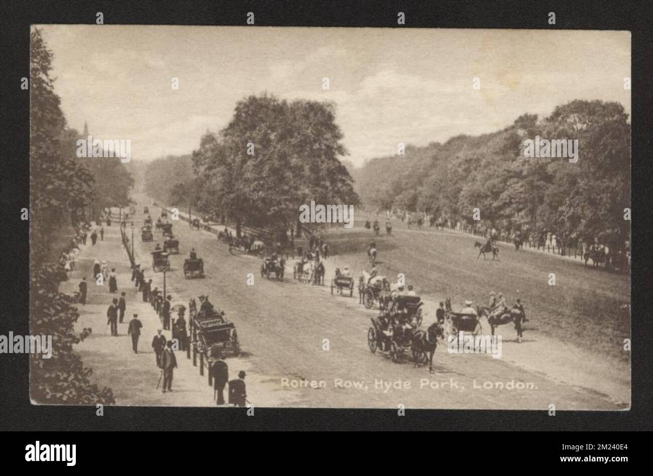 Rotten Row Hyde Park Corner London real Photograph postcard circa late 19th century showing carriages and pedestrians on Promenade. Stock Photo