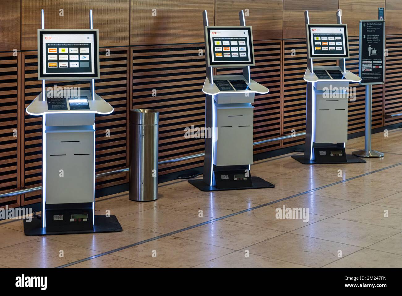 BERLIN, GERMANY - DECEMBER 12, 2022: Automated check-in at the Airport BER. Innovation at the service of people, automation and also staff reduction. Stock Photo
